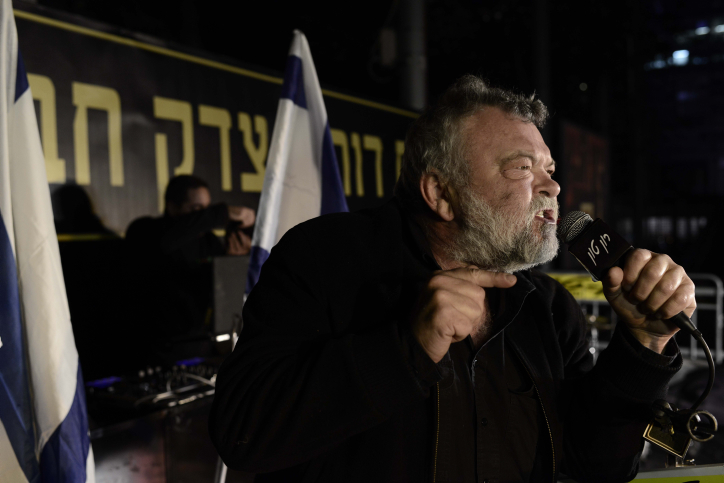 Knesset member Ilan Gilon speaks during a protest against soaring prices of living in Tel Aviv's Rabin Square on January 18, 2014. Photo by Tomer Neuberg/Flash90 *** Local Caption *** . ???? ????? ?? ?????? ???? ???? ????? ??? ????? ???? ?????
